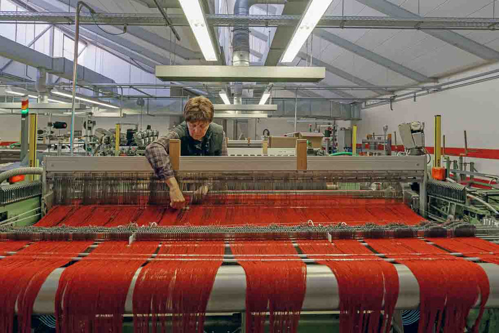 women tending a loom at Germany's oldest mill