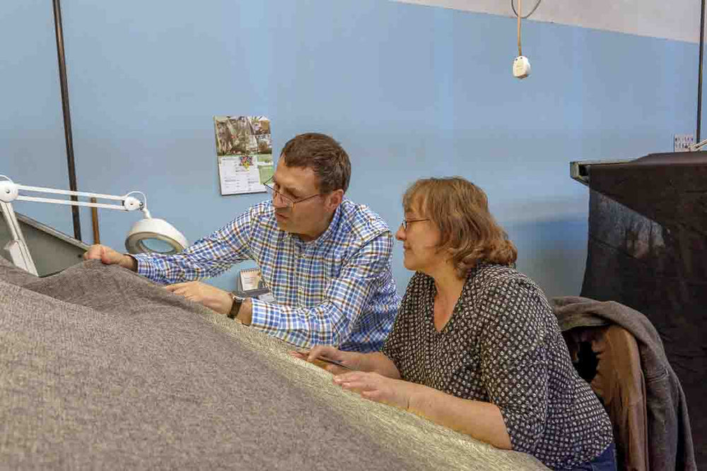 inspecting a fine loden wool fabric
