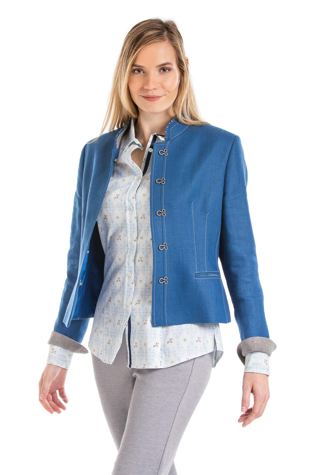 young blonde women wearing a blue Austrian linen jacket