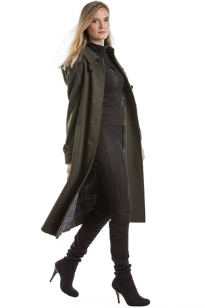 30 year old blonde woman wearing a Robert W. Stolz german loden wool coat 