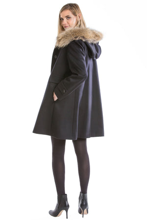 a german loden coat worn by a beautiful blonde girl