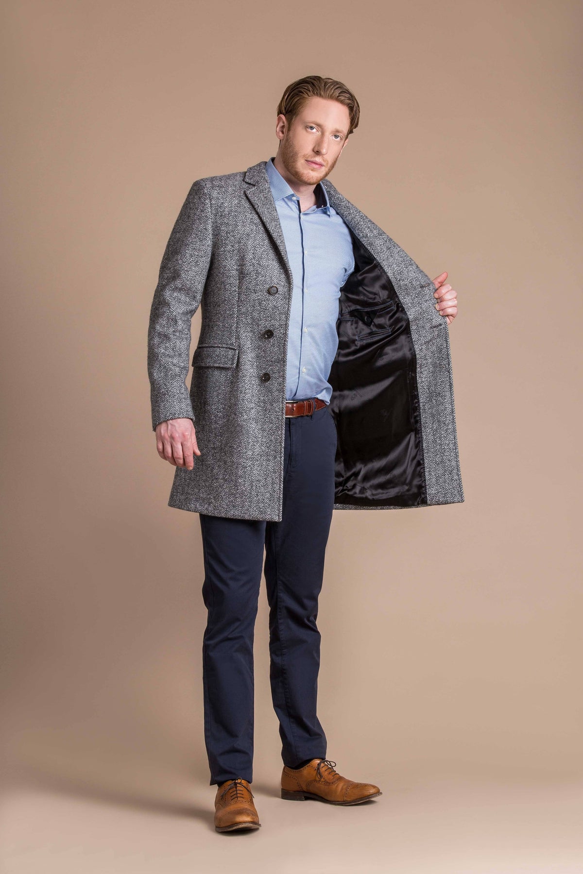 man wearing a Robert W. Stolz boiled wool herringbone weave overcoat 